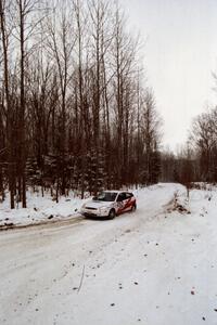 Ken Kovach / Dave Bruce Ford Focus sets up for a sharp corner on SS1, Hardwood Hills Rd.