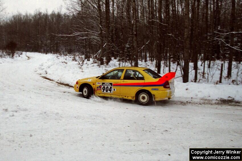 John Drislane / Declan Hegarty Mitsubishi Lancer Evo IV at a sharp corner on SS1, Hardwood Hills Rd.