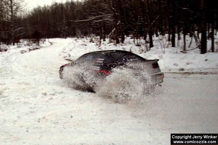 Dennis Martin / Chris Plante Mitsubishi Eclipse GSX goes off into a bank on SS1, Hardwood Hills Rd.