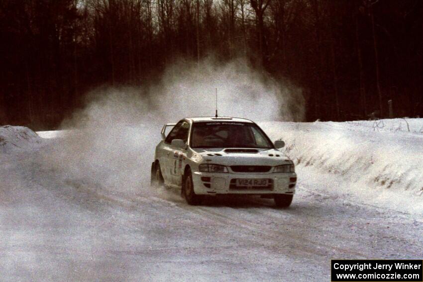 Karl Scheible / Brian Maxwell Subaru WRX STi at speed on SS4, Avery Lake.