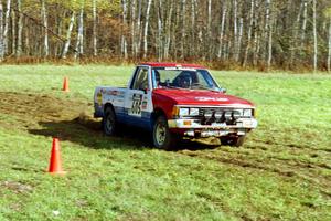 Paul Flores / Sean Figgins Nissan Pickup on SS1, Casino.