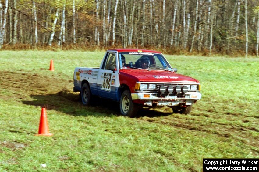 Paul Flores / Sean Figgins Nissan Pickup on SS1, Casino.