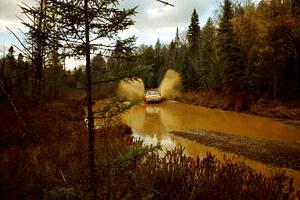 Doug Shepherd / Pete Gladysz Mitsubishi Eclipse at the midpoint water crossing on SS2, Herman.