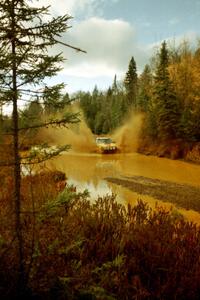 Steve Gingras / Bill Westrick Subaru Impreza 2.5RS at the midpoint water crossing on SS2, Herman.