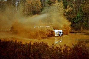 Pat Richard / Ben Bradley Subaru WRX STi at the midpoint water crossing on SS2, Herman.