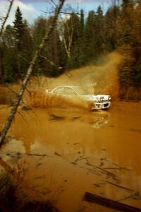 Henry Krolikowski / Cindy Krolikowski Subaru WRX STi at the midpoint water crossing on SS2, Herman.