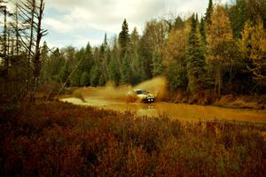 Lon Peterson / Bill Gutzmann Subaru Impreza 2.5RS at the midpoint water crossing on SS2, Herman.