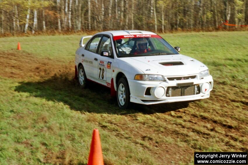 Paul Dunn / Rebecca Dunn Mitsubishi Lancer Evo IV at the midpoint water crossing on SS2, Herman.