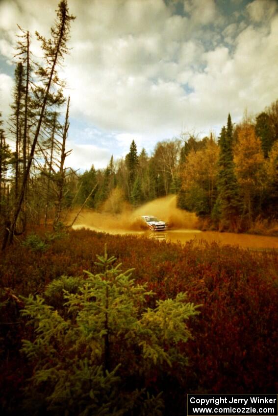 David Higgins / Craig Thorley Subaru WRX at the midpoint water crossing on SS2, Herman.