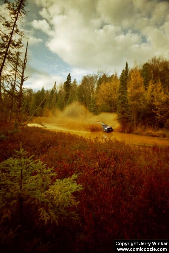 Karl Scheible / Brian Maxwell Subaru WRX STi at the midpoint water crossing on SS2, Herman.