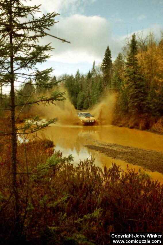 Steve Gingras / Bill Westrick Subaru Impreza 2.5RS at the midpoint water crossing on SS2, Herman.