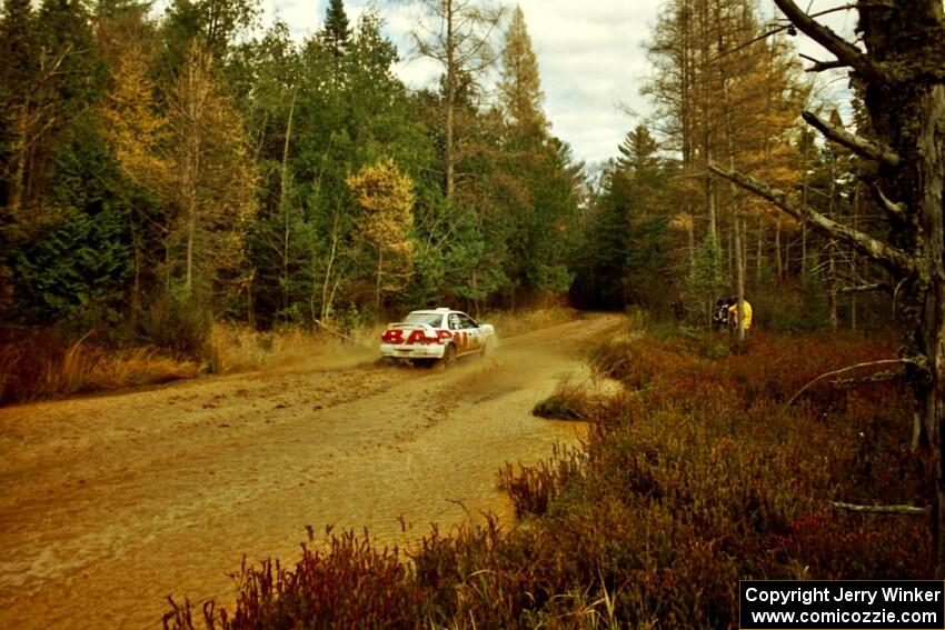 Henry Krolikowski / Cindy Krolikowski Subaru WRX STi at the midpoint water crossing on SS2, Herman.