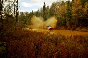 Mark Utecht / Brenda Lewis Mitsubishi Eclipse GSX at the midpoint water crossing on SS2, Herman.