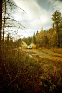 Tad Ohtake / Bob Martin Ford Escort ZX2 at the midpoint water crossing on SS2, Herman.