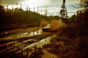 Jonathan Ryther / Janice Damitio Subaru Impreza 2.5RS at the midpoint water crossing on SS2, Herman.