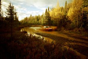 Gail Truess / Pam McGarvey Mazda 323GTX at the midpoint water crossing on SS2, Herman.