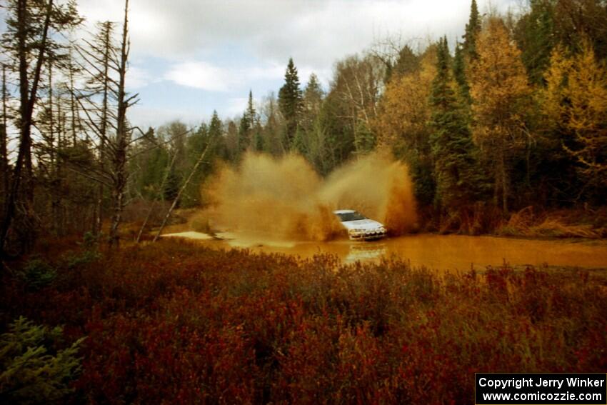 Bryan Pepp / Jerry Stang Eagle Talon at the midpoint water crossing on SS2, Herman.