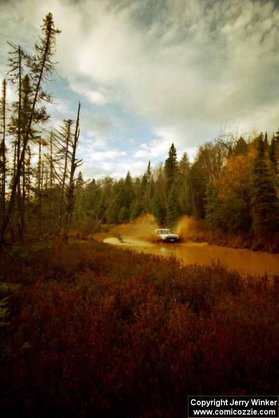 Bob Nielsen / Ed Wahl VW GTI at the midpoint water crossing on SS2, Herman.