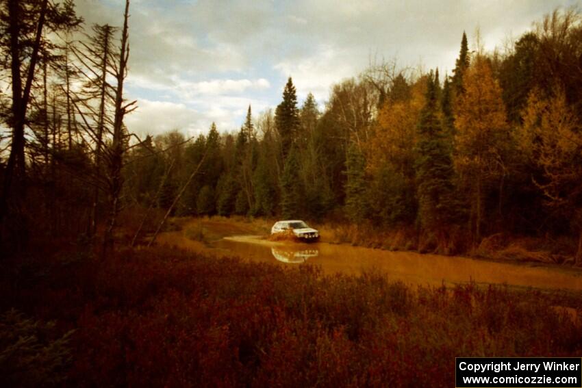 Tony Chavez / Doug Robinson VW GTI at the midpoint water crossing on SS2, Herman.