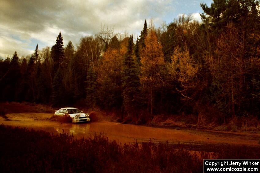 Jason Rivas / Ole Holter Subaru WRX at the midpoint water crossing on SS2, Herman.
