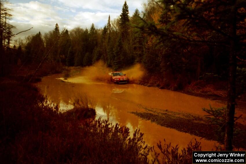 Charles Sherrill / Bryan O'Neal Honda CRX Si at the midpoint water crossing on SS2, Herman.