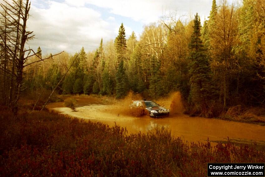 James Robinson / Jim Newton Honda Civic at the midpoint water crossing on SS2, Herman.