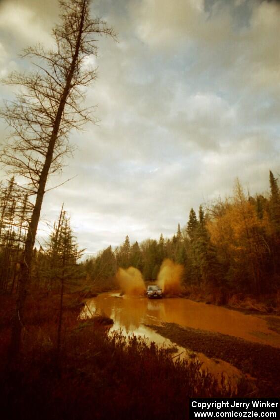 Doug Havir / Scott Putnam Subaru WRX at the midpoint water crossing on SS2, Herman.