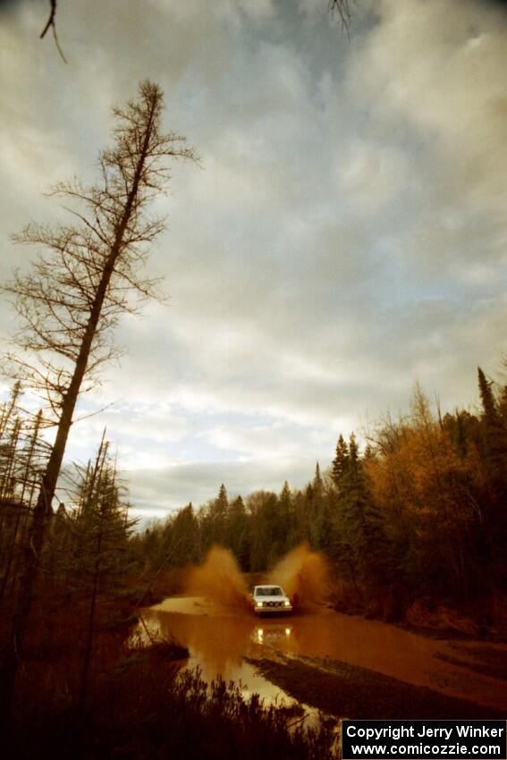 Jerry Brownell / Jim Windsor Chevy Citation X-11 at the midpoint water crossing on SS2, Herman.