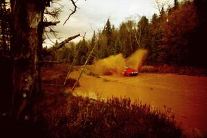 Dave LaFavor / Bob LaFavor Eagle Talon at the midpoint water crossing on SS2, Herman.