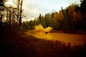 Mary Utecht / Heidi Meyers Dodge Omni GLH Turbo at the midpoint water crossing on SS2, Herman.