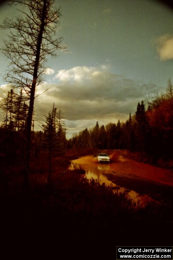 Dan Malott / Matt Malott Eagle Talon at the midpoint water crossing on SS2, Herman.