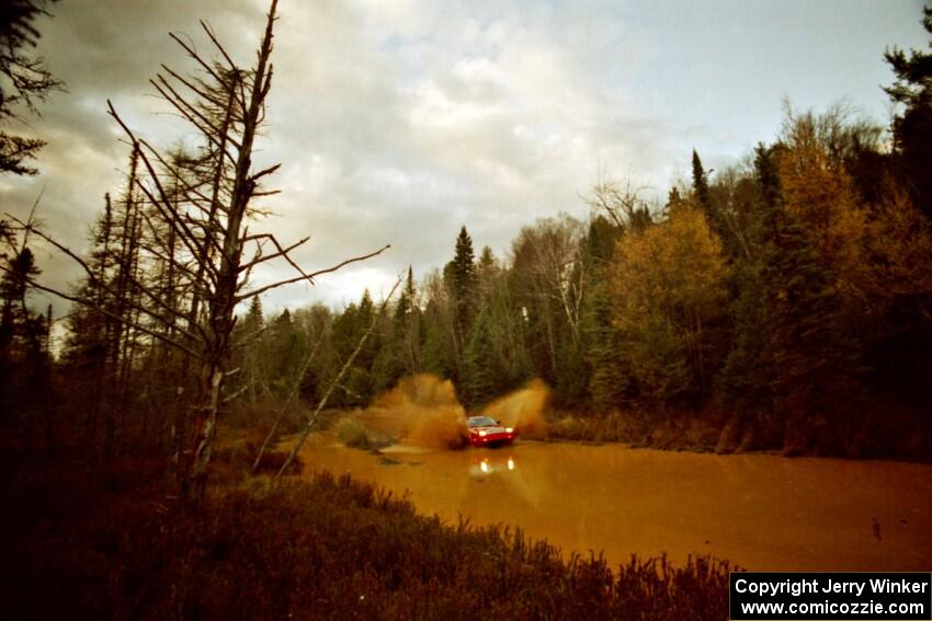 Steve Irwin / Phil Schmidt Toyota MR2 at the midpoint water crossing on SS2, Herman.