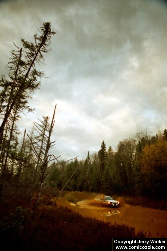 Ken Hawley / Emily Burton-Weinman Audi 4000S Quattro at the midpoint water crossing on SS2, Herman.