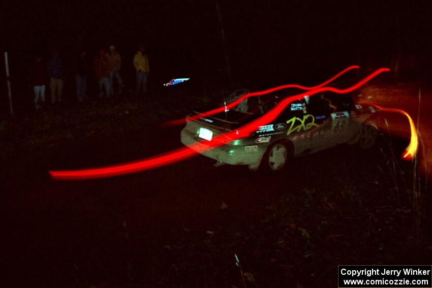 Tad Ohtake / Bob Martin Ford Escort ZX2 at speed near the finish of SS6, Passmore II.