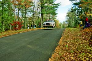 Mark Nelson / Alex Gelsomino Mitsubishi Lancer Evo VI catches air at the midpoint jump on SS16, Brockway Mt.