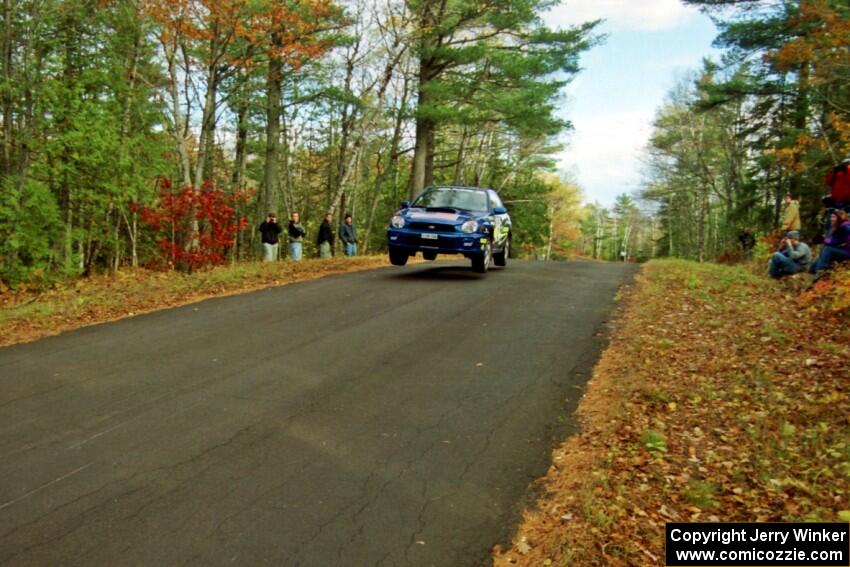 Karl Scheible / Brian Maxwell Subaru WRX STi catches air at the midpoint jump on SS16, Brockway Mt.