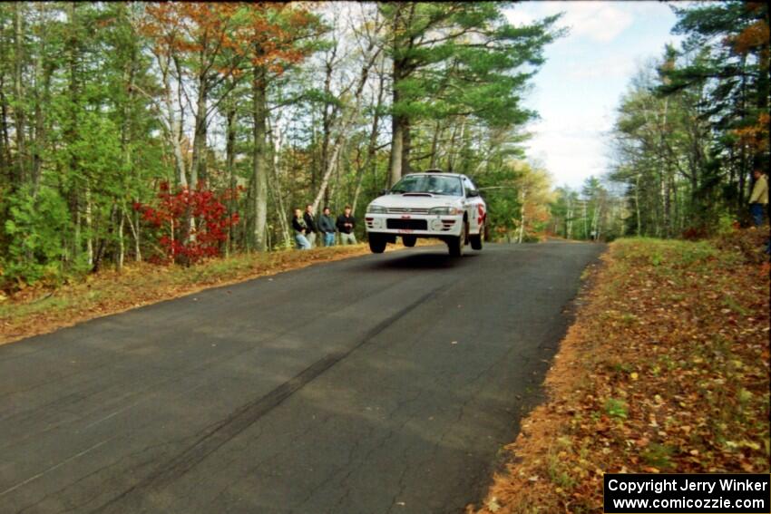 Henry Krolikowski / Cindy Krolikowski Subaru WRX STi at the midpoint jump on SS16, Brockway Mt.