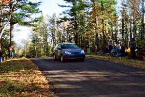 Craig Peeper / Ian Bevan Ford Focus at the midpoint jump on SS16, Brockway Mt.