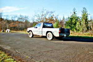 Bryan Ackerman / Sumit Panjabi Mitsubishi Mighty Max at speed on SS16, Brockway Mt.