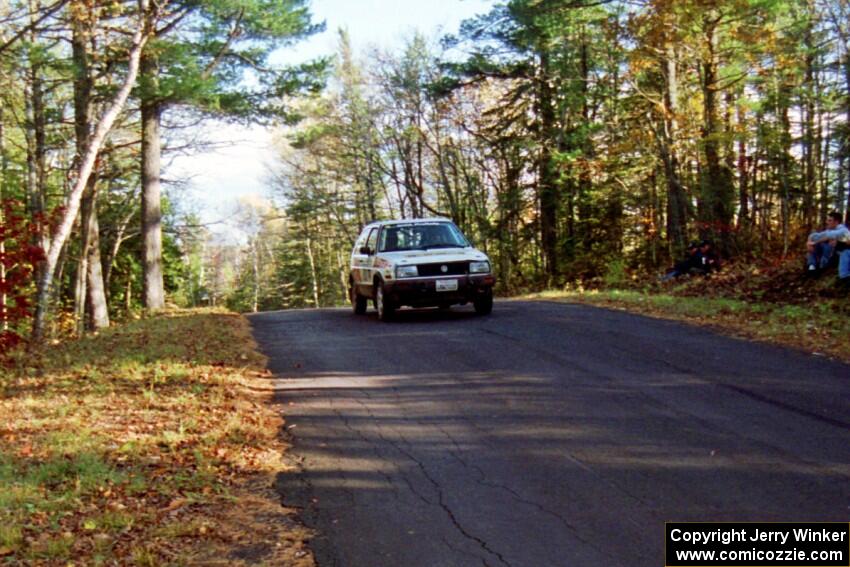 Tony Chavez / Doug Robinson VW GTI at the midpoint jump on SS16, Brockway Mt.