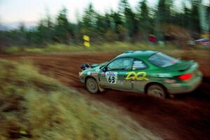 Tad Ohtake / Bob Martin Ford Escort ZX2 comes through the spectator corner on SS19, Gratiot Lake II.