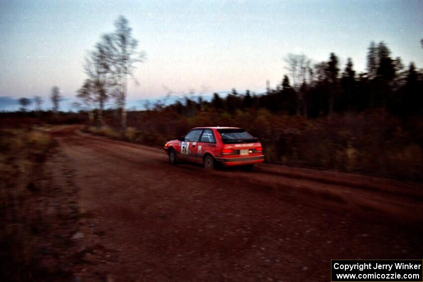 Gail Truess / Pam McGarvey Mazda 323GTX near the finish of SS19, Gratiot Lake II.