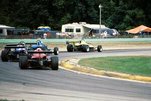 Five Mondiale Formula SAABs battle in turn 3.