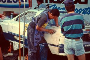 David Lapham's Mazda RX-7 Turbo gets some body work done on Friday night.