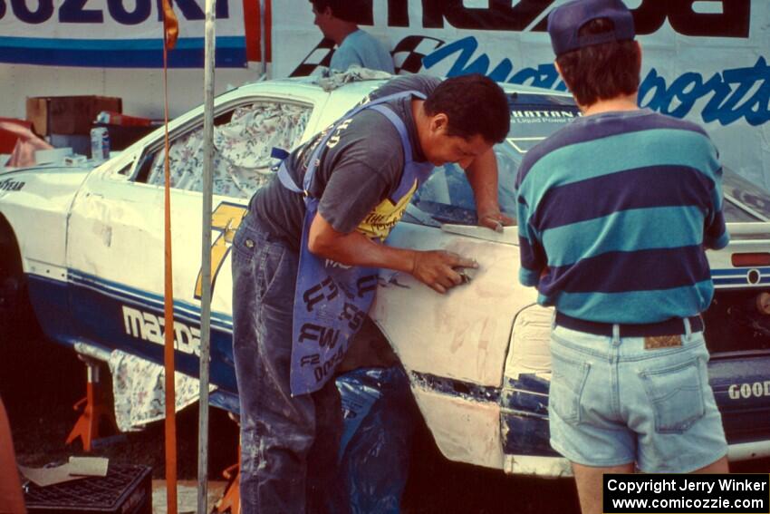 David Lapham's Mazda RX-7 Turbo gets some body work done on Friday night.