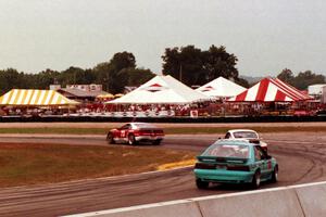 Elliott Forbes-Robinson's Nissan 300ZX Turbo, Nick Ham's Porsche 911 Turbo and Andy Pilgrim's Ford Mustang Saleen SC