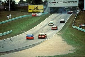 Richard Holdener's Ford Mustang Cobra pulls off the course.