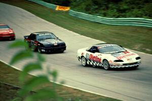 Bill Cooper's Chevy Camaro and Terry Borcheller's Ford Mustang Saleen