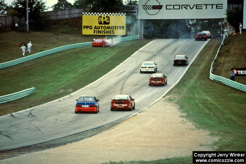 Richard Holdener's Ford Mustang Cobra pulls off the course.