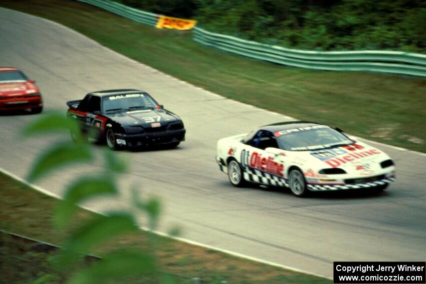 Bill Cooper's Chevy Camaro and Terry Borcheller's Ford Mustang Saleen